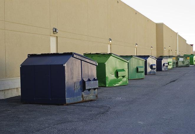 a row of large construction dumpsters on-site in Congress OH