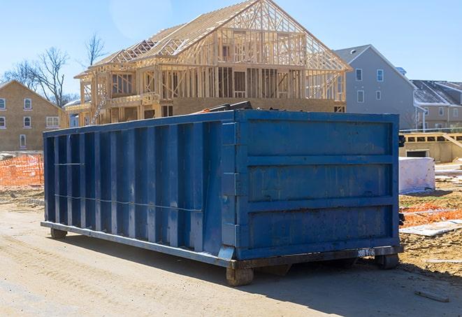 a variety of residential roll-off dumpsters for home construction sites